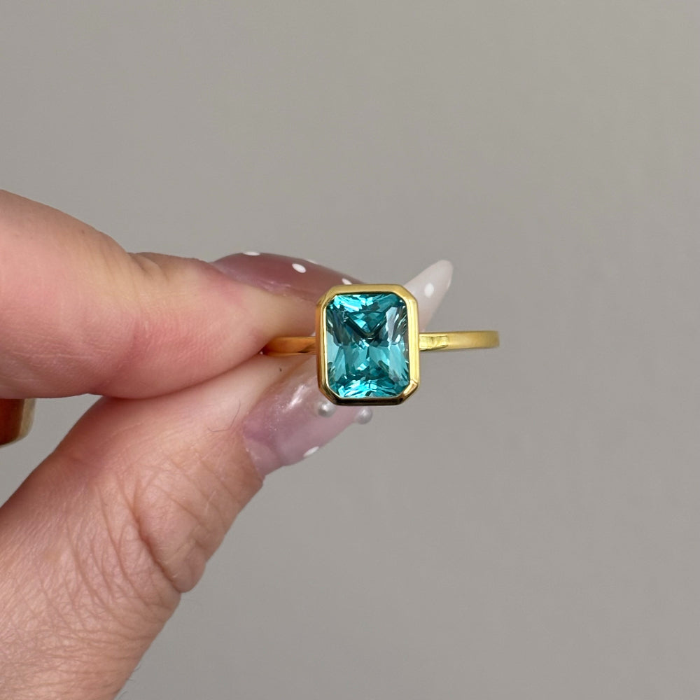 Paraiba Blue Bezel Ring - Radiant Cut